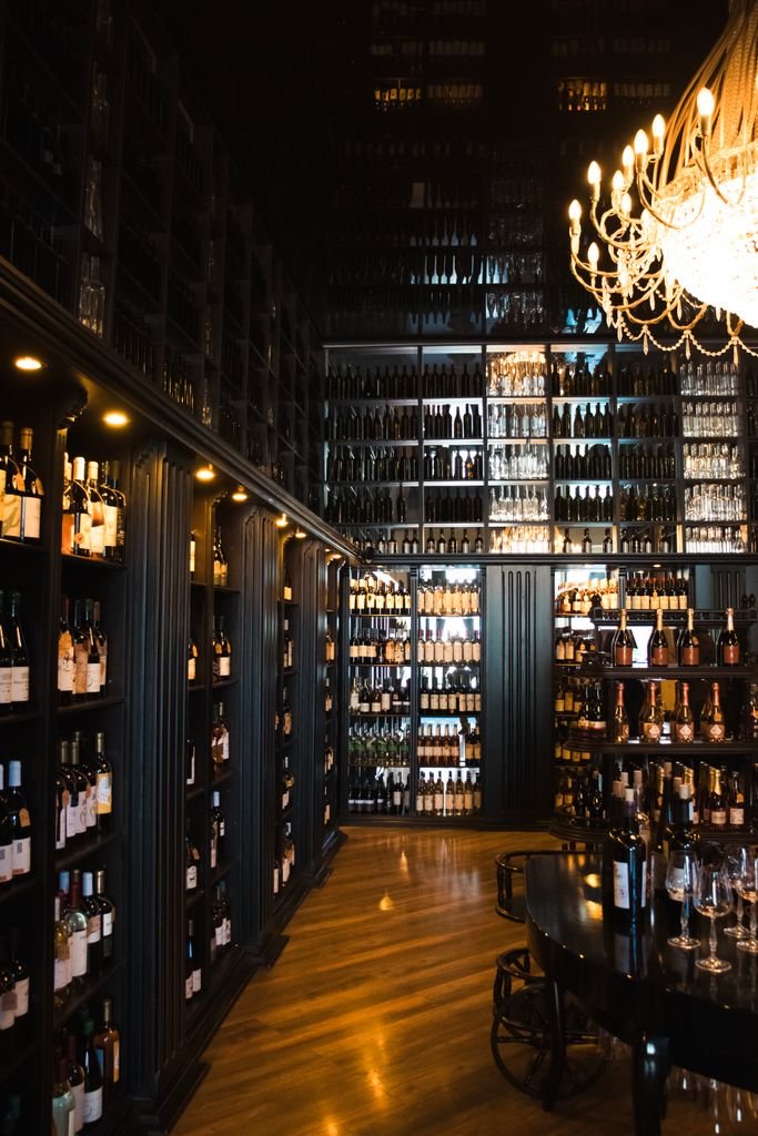 Discover an elegant wine cellar with a chandelier at a fine dining location in Tbilisi.
